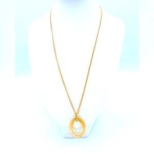 Vintage Monet Gold Tone Dainty Necklace With A Oval Pendant With Moving Parts